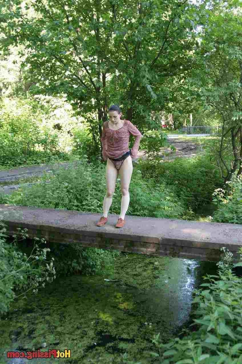 15P Slut pissing off a bridge