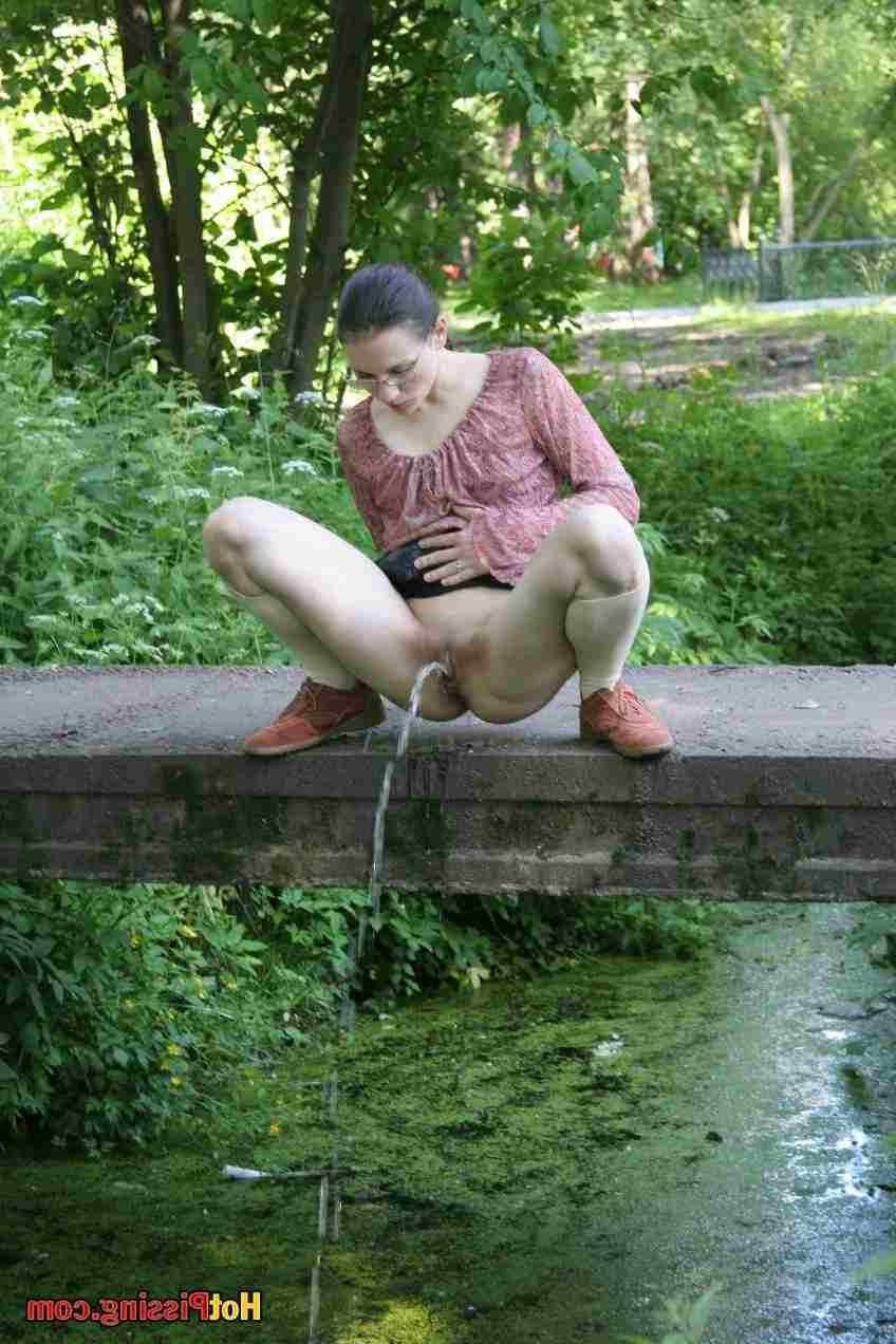 15P Slut pissing off a bridge