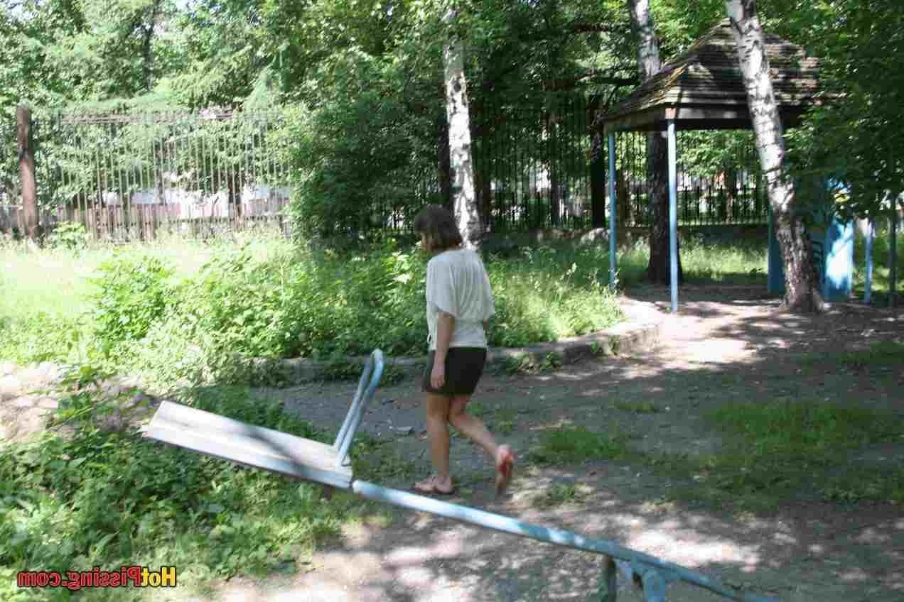 15P Slut pissing outdoors