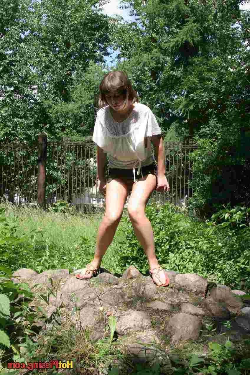 15P Slut pissing outdoors