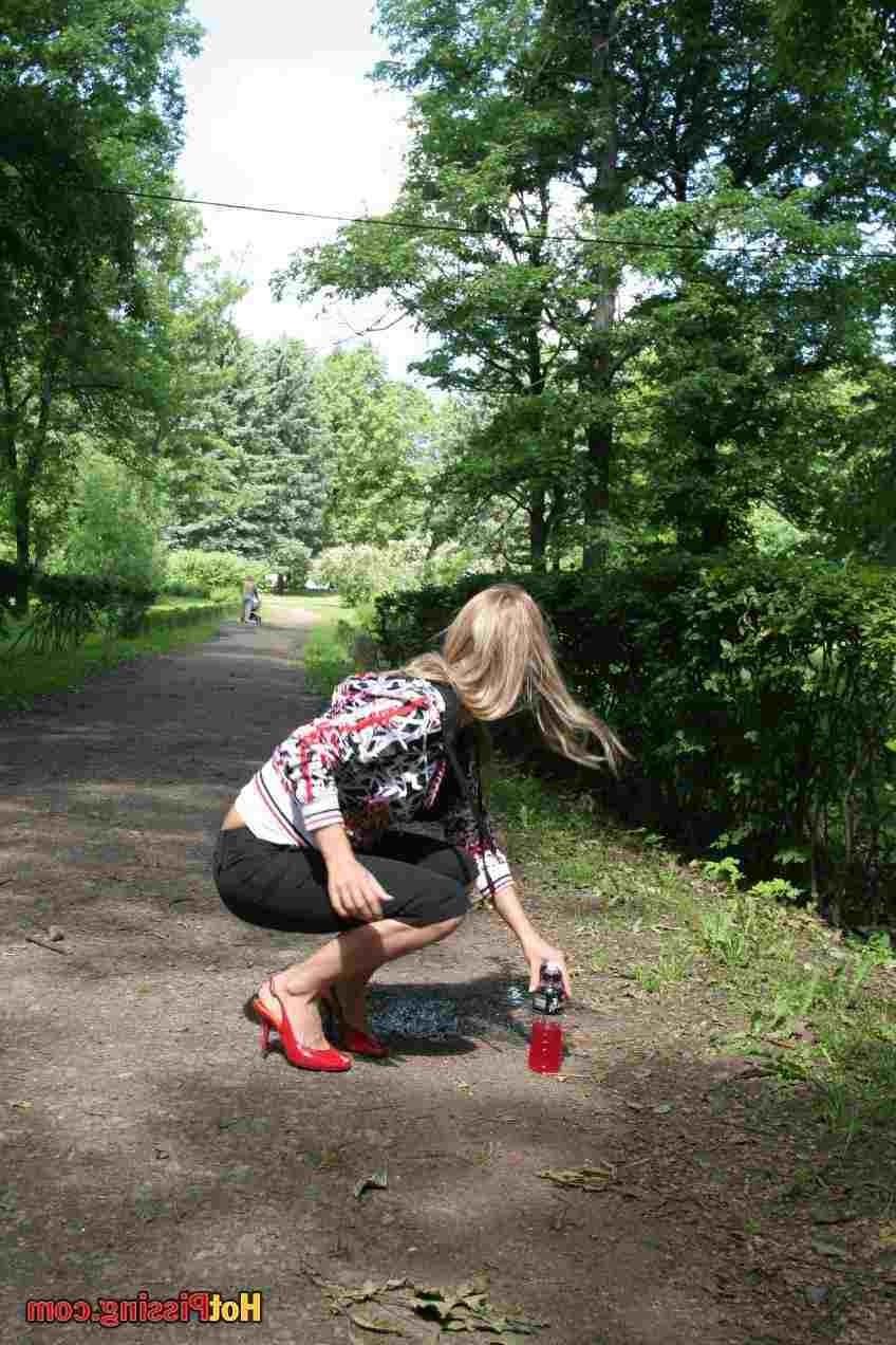 15P Slut pissing outdoors
