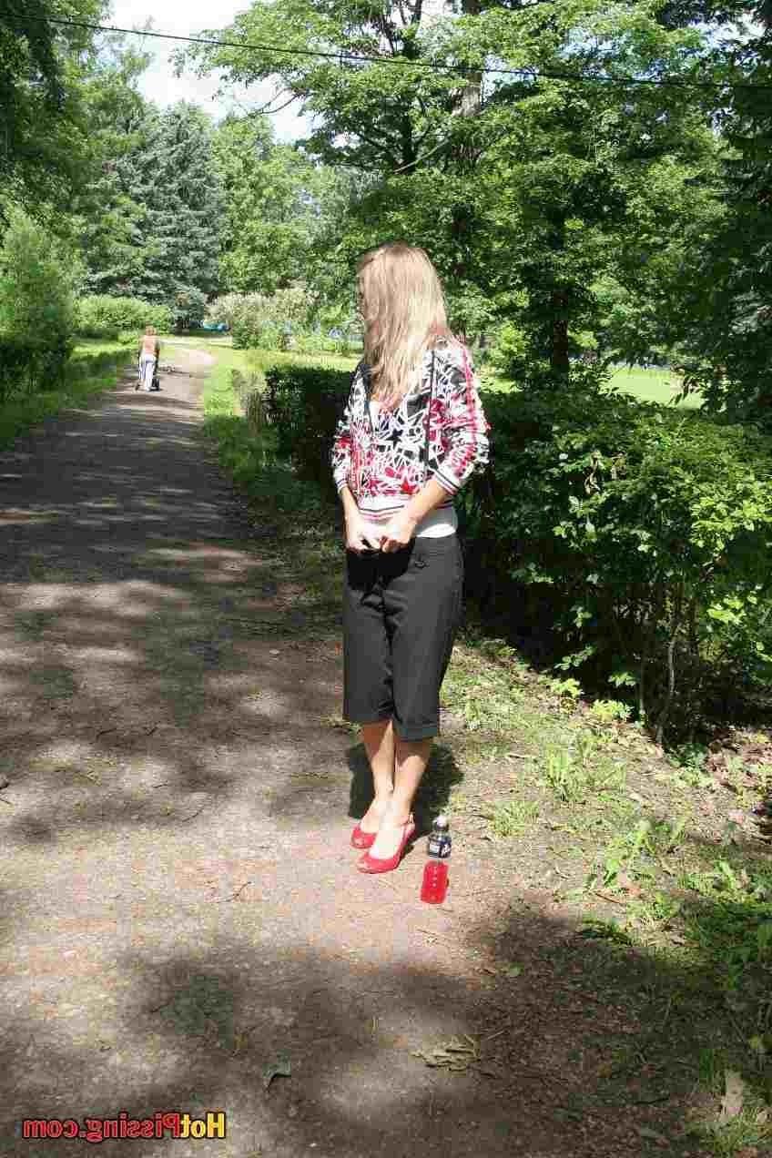 15P Slut pissing outdoors