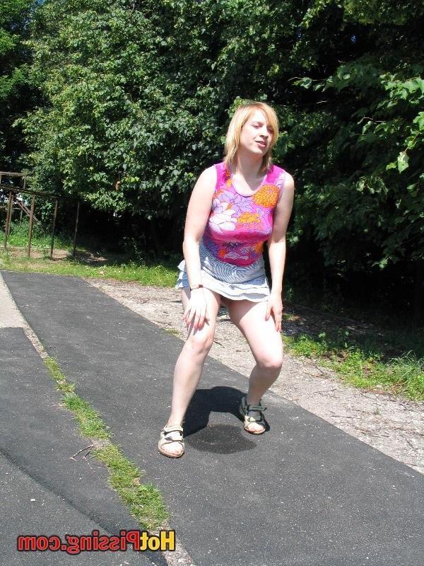 13P Yummy blonde slut in a mini squatted on the road for bold piddling