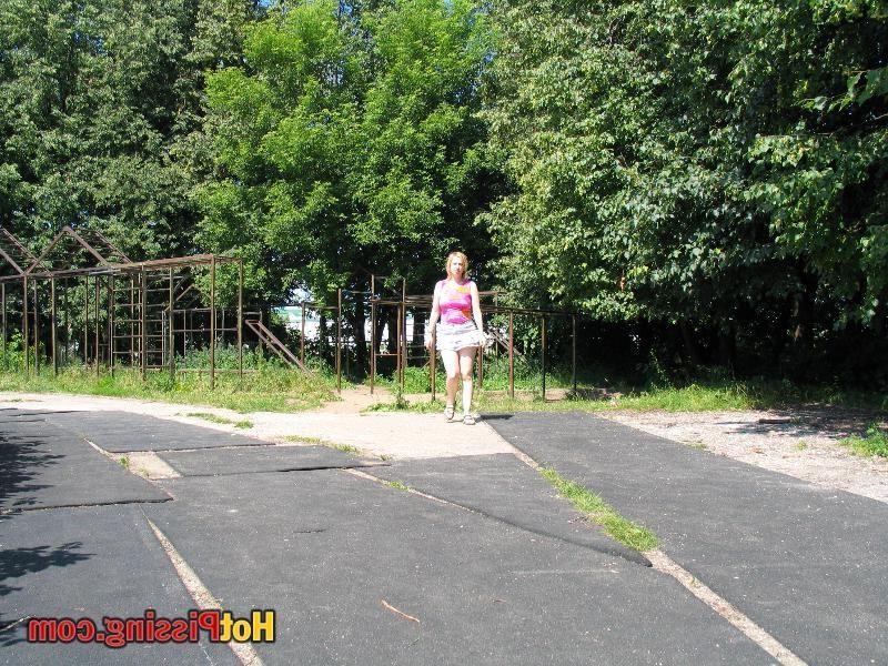 13P Yummy blonde slut in a mini squatted on the road for bold piddling