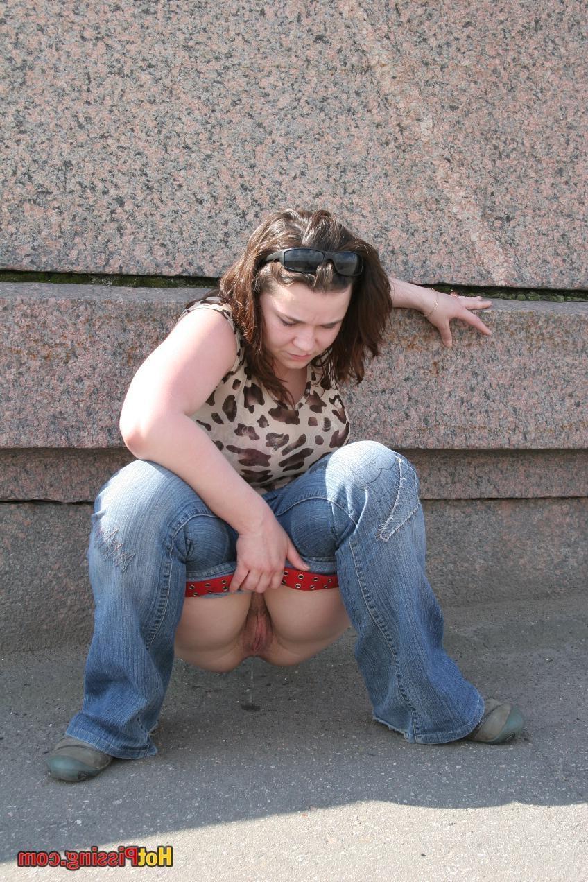10P Beauty with amazing jugs voids her bladder in the street with bliss