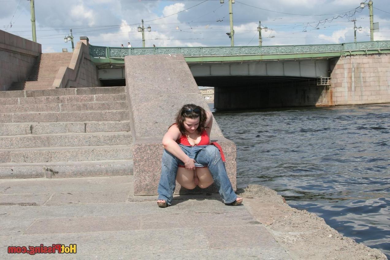 10P Big-breasted fatty demonstrates her luscious peeing koochie riverside