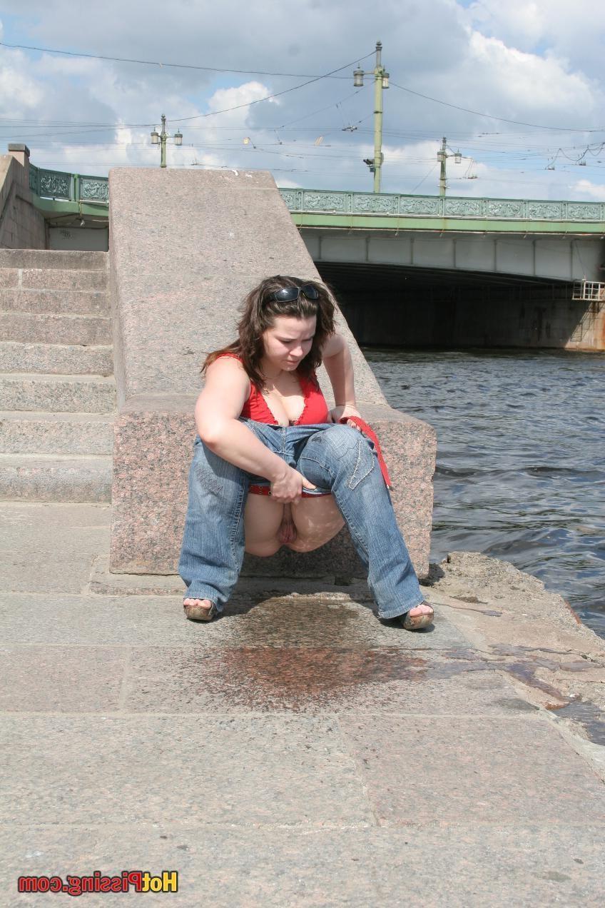 10P Big-breasted fatty demonstrates her luscious peeing koochie riverside