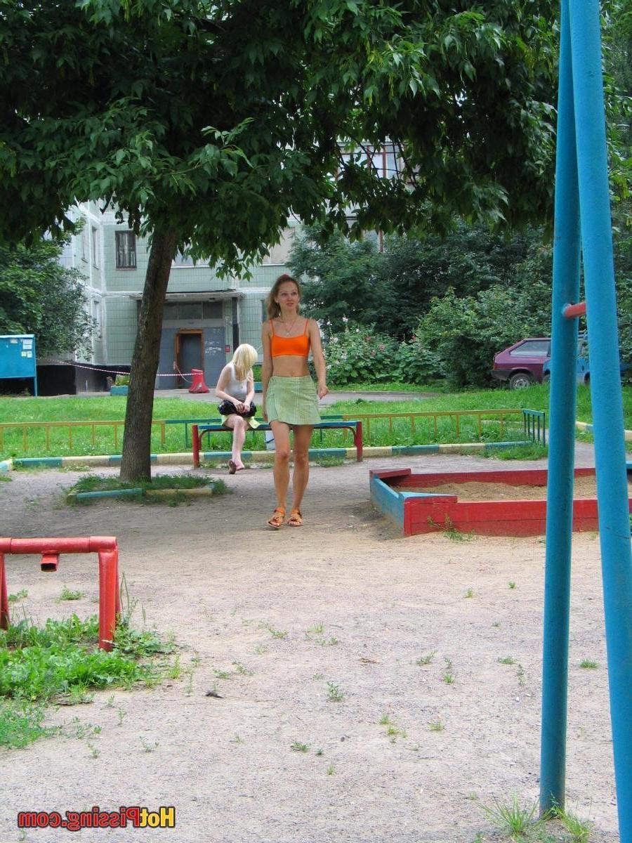 10P Blonde chickie in summer get-up teeters and makes a wee-wee playfully
