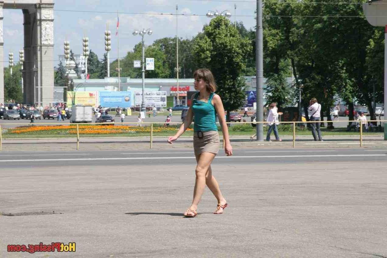 15P Slut pissing outdoors