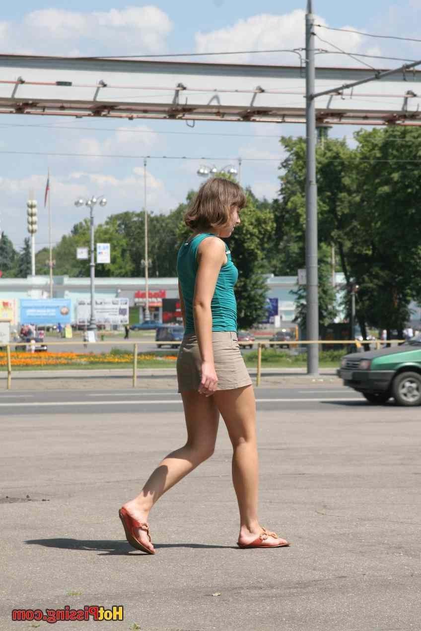 15P Slut pissing outdoors