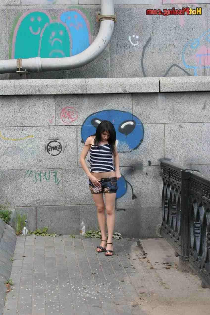 15P Slut pissing outdoors