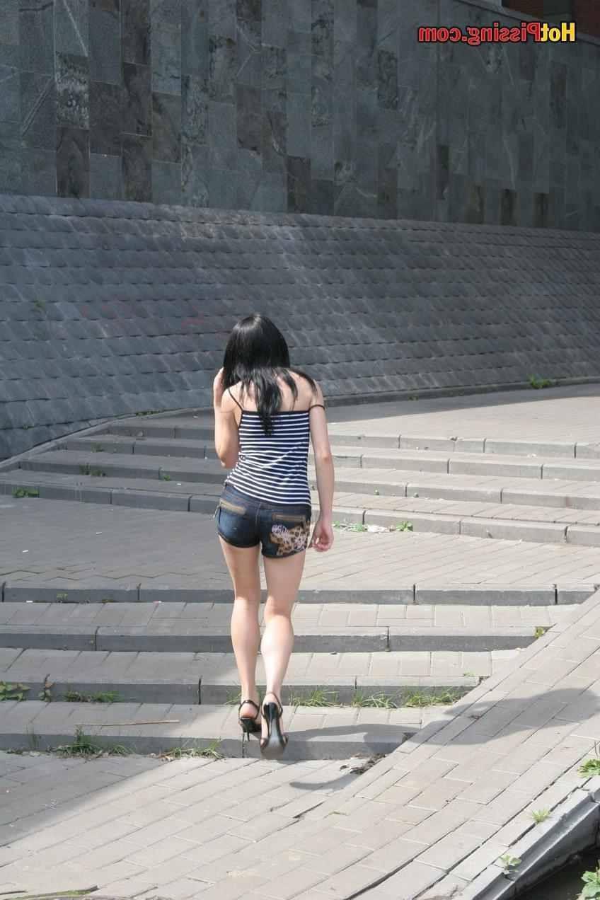 15P Slut pissing outdoors