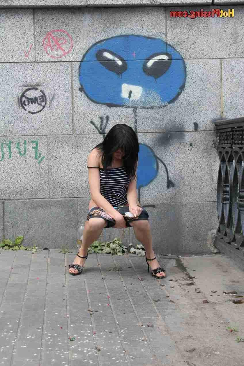 15P Slut pissing outdoors