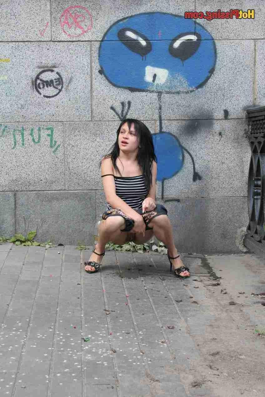15P Slut pissing outdoors