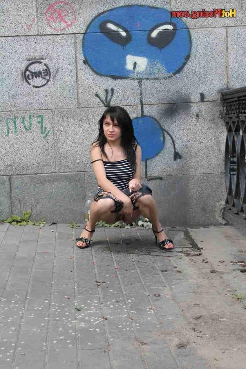 15P Slut pissing outdoors