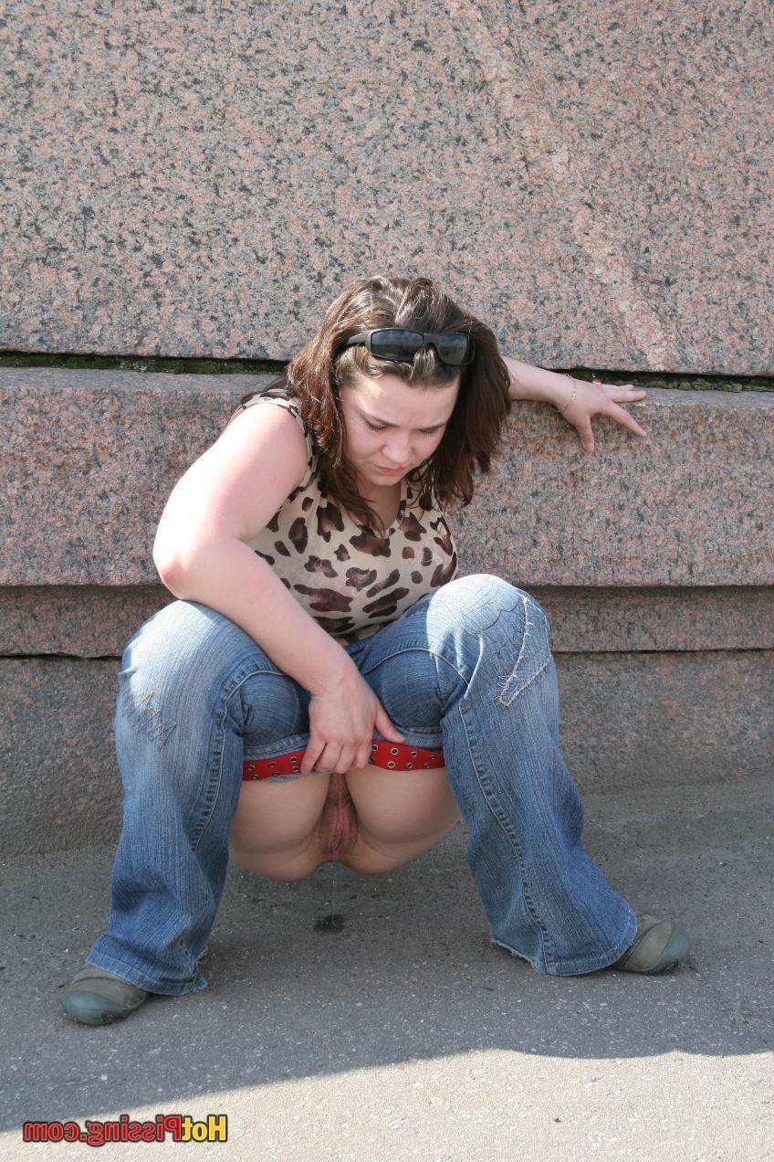 15P Boobiferous miss in jeans enjoys taking a piss in the summer street