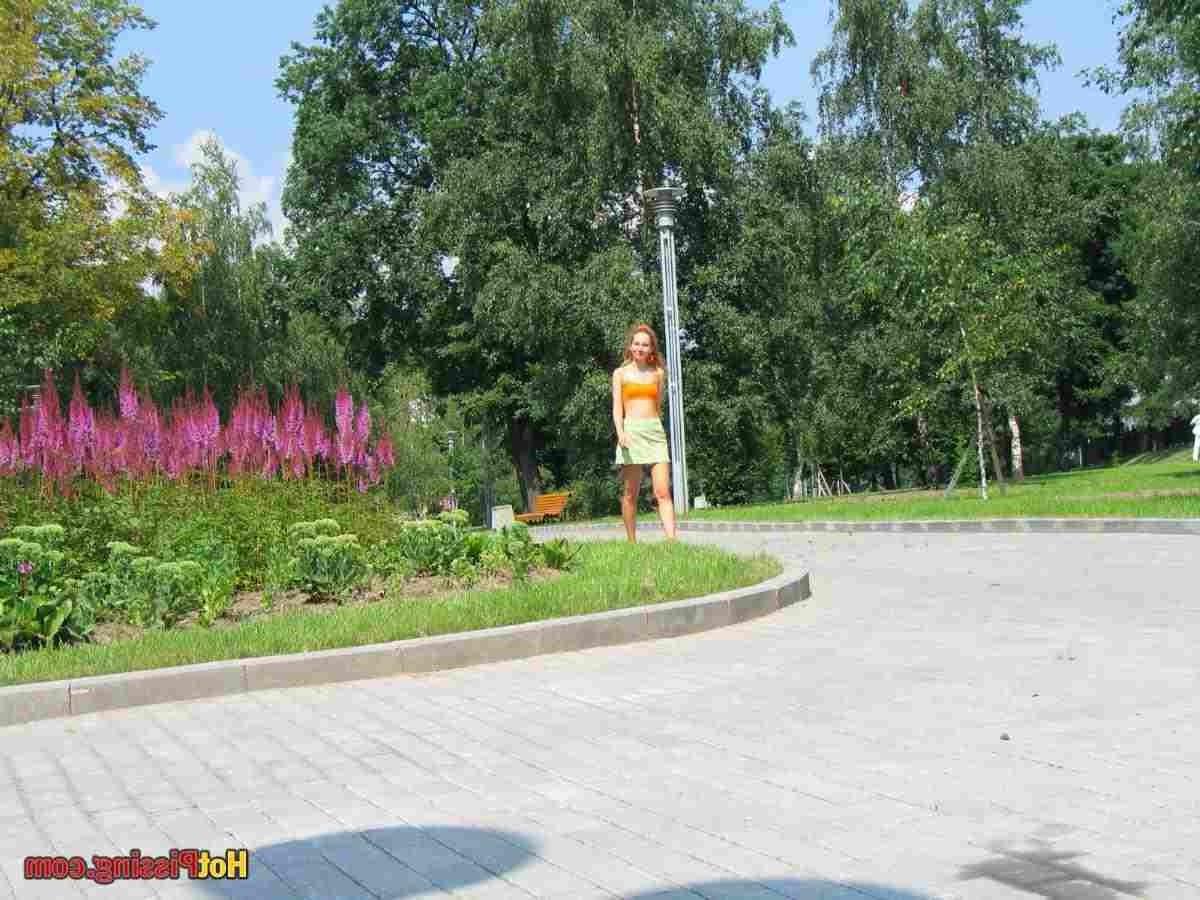 15P Slut pissing outdoors