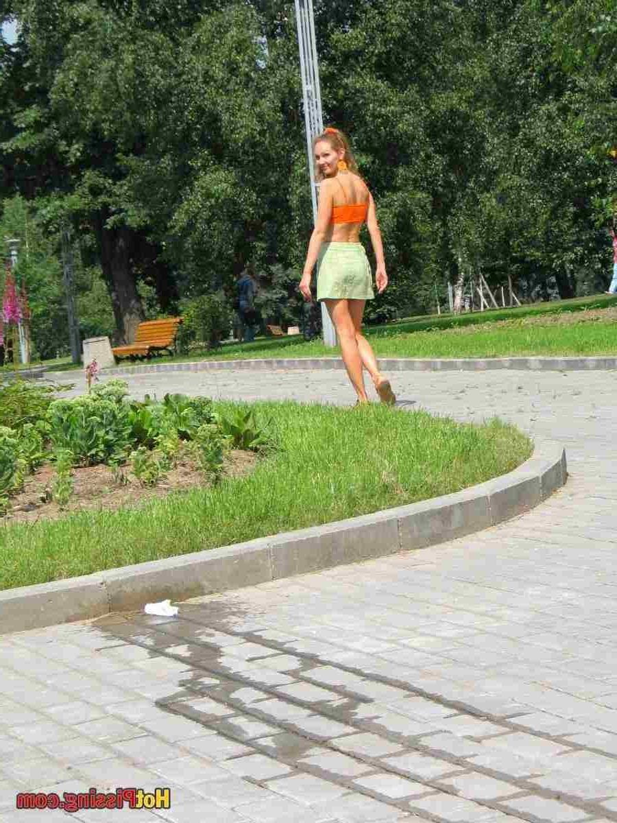 15P Slut pissing outdoors