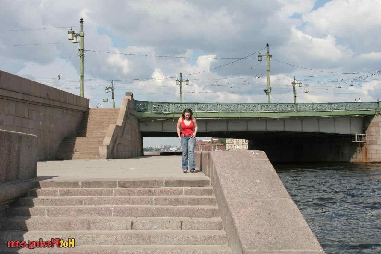 15P Slut pissing outdoors