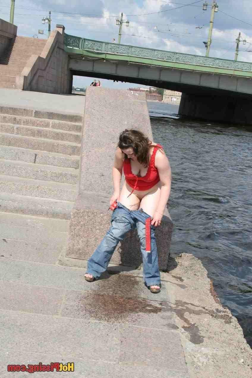 15P Slut pissing outdoors