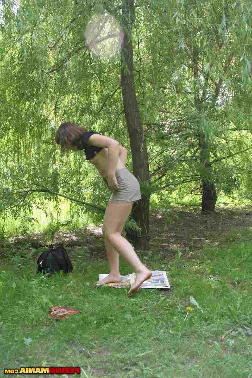 15P Slut pissing outdoors