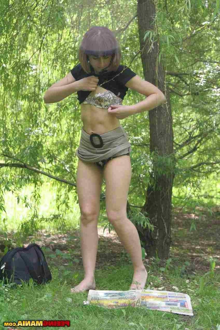 15P Slut pissing outdoors