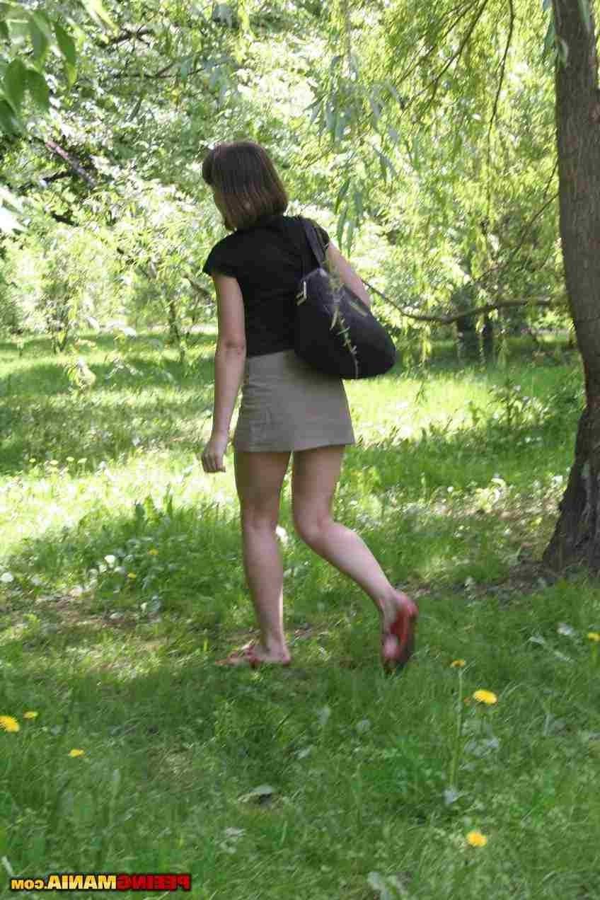 15P Slut pissing outdoors