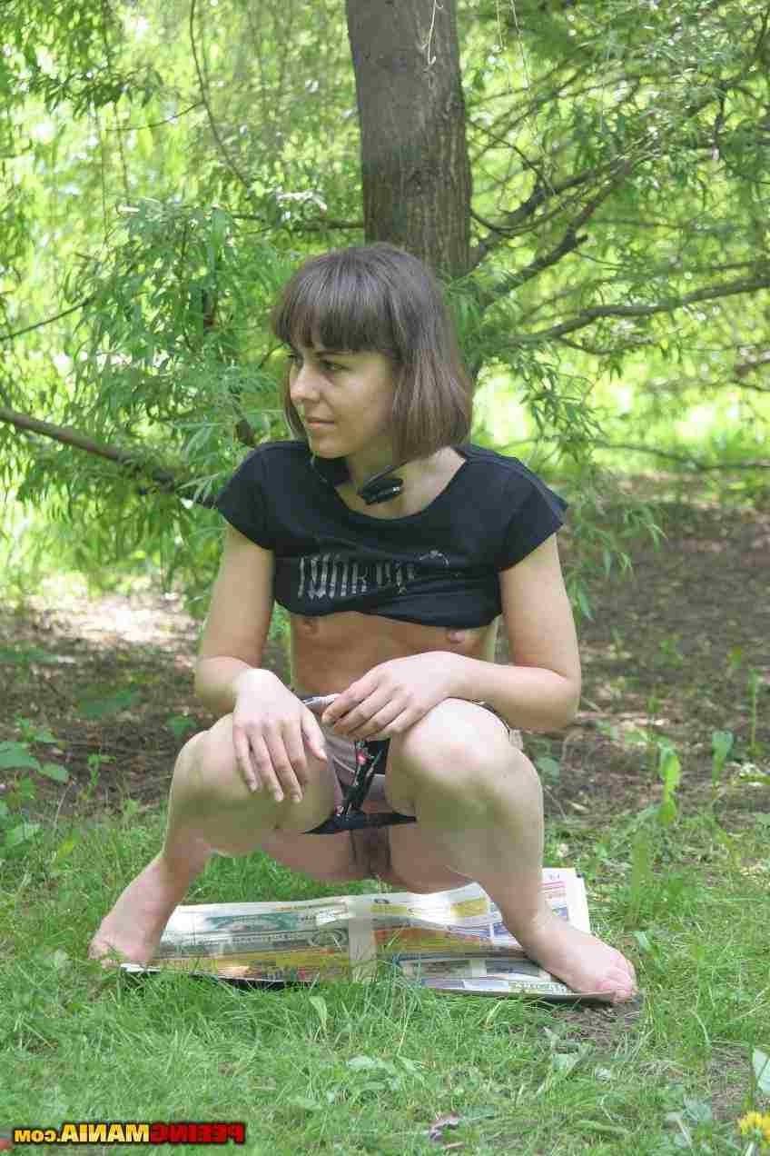 15P Slut pissing outdoors