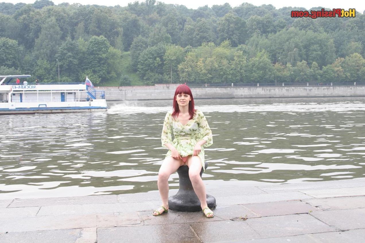 15P This babe sits on some cold metallic staff and lunching hot urine stream