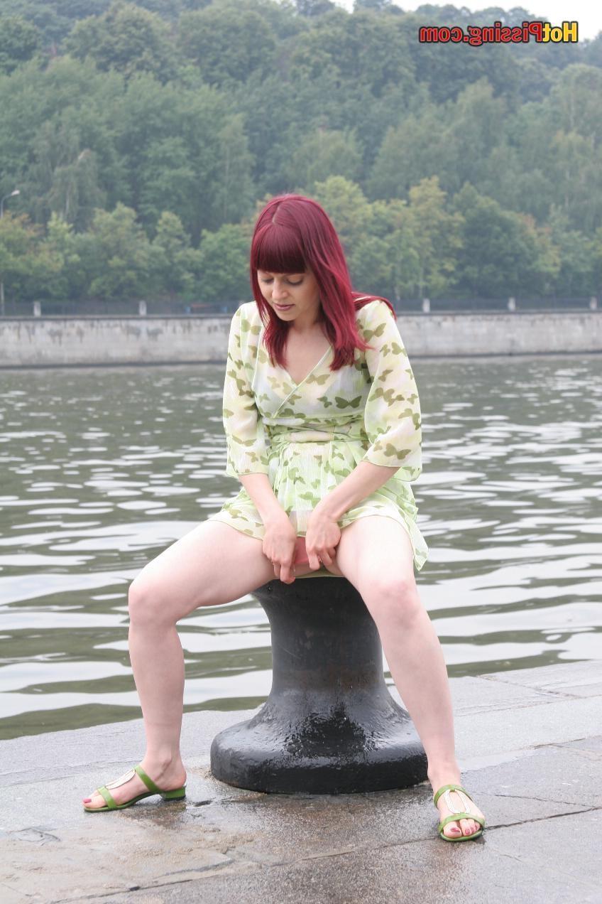 15P This babe sits on some cold metallic staff and lunching hot urine stream