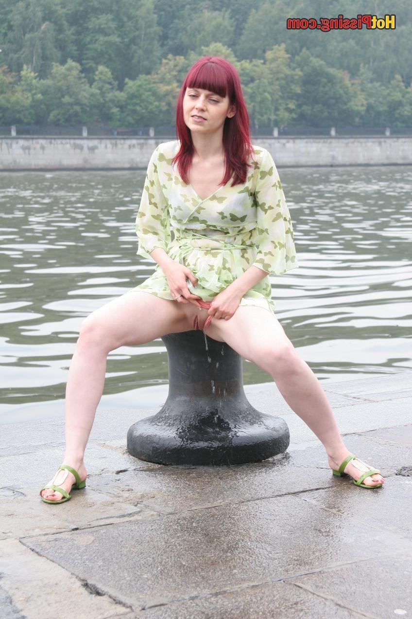 15P This babe sits on some cold metallic staff and lunching hot urine stream
