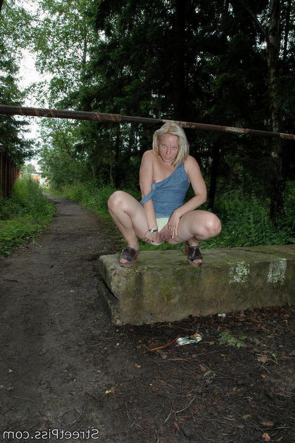 12P Leggy blonde squats to pee on a concrete block