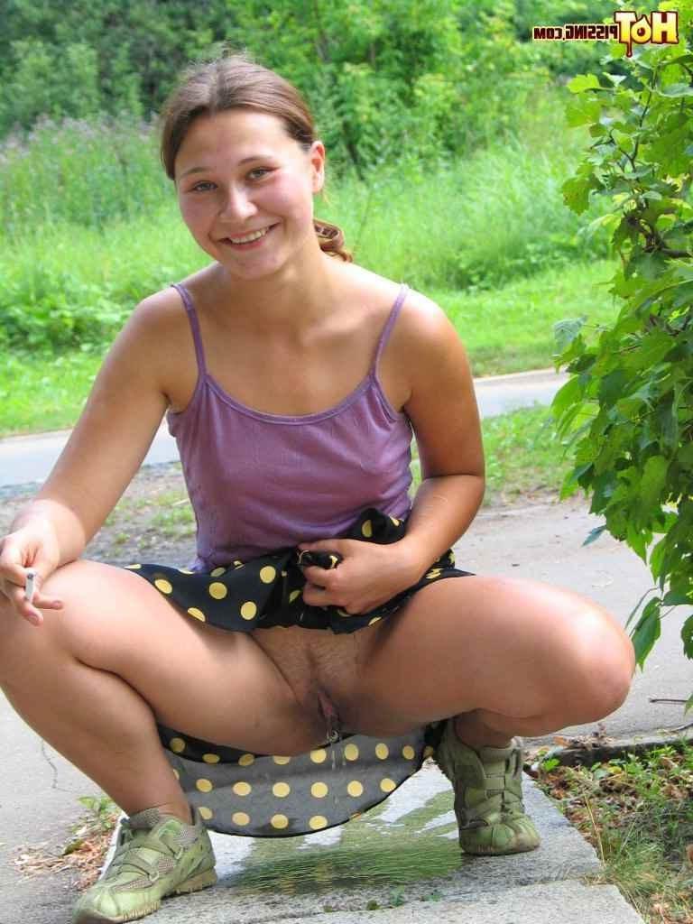 15P Slut pissing outdoors