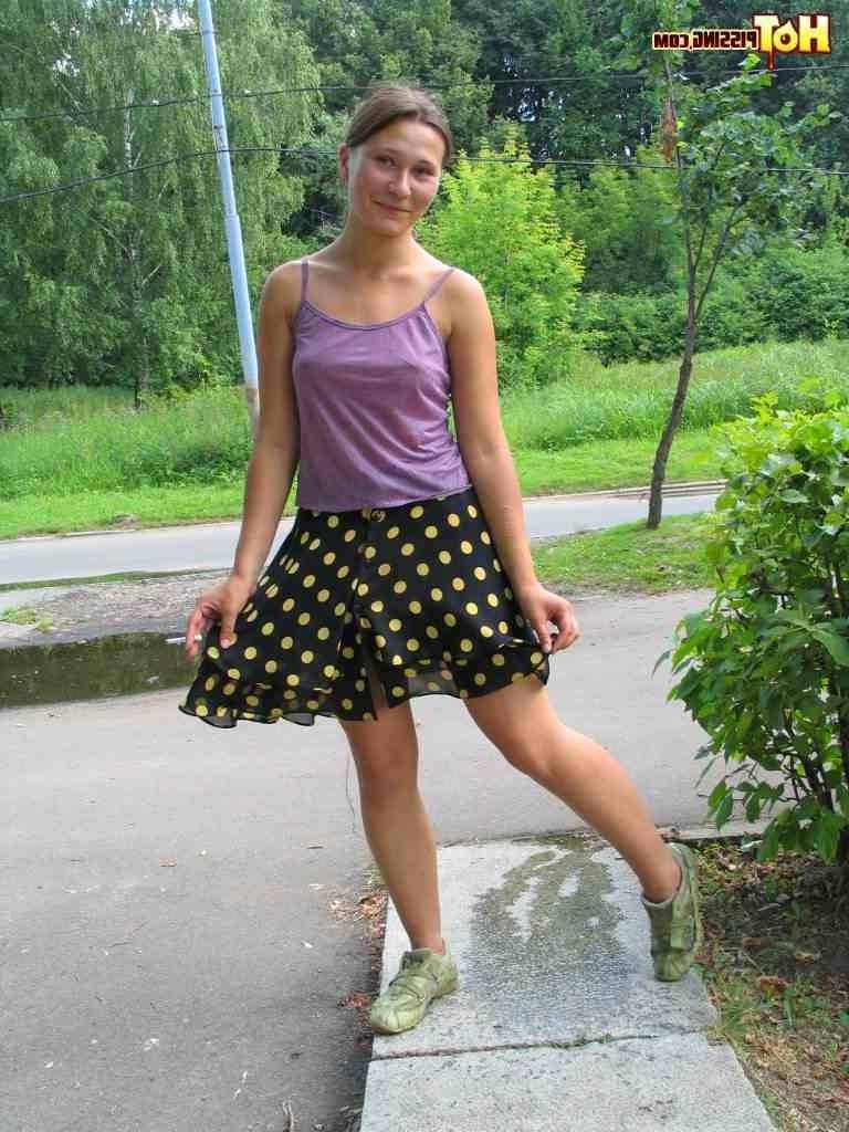 15P Slut pissing outdoors
