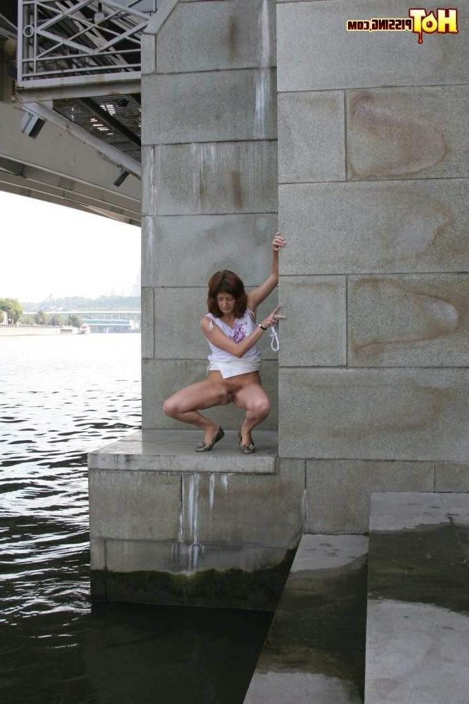 16P Slut pissing outdoors