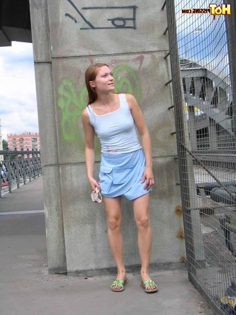 16P Slut pissing outdoors