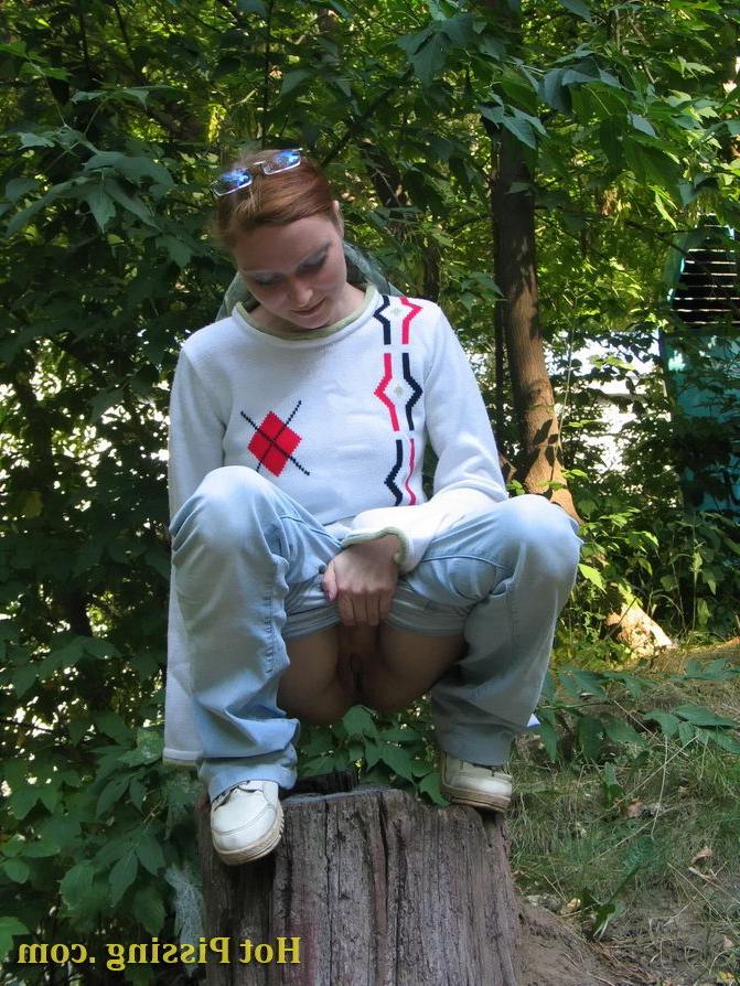 15P Amiable chickie climbs on a stub and starts doing a pee-wee selflessly