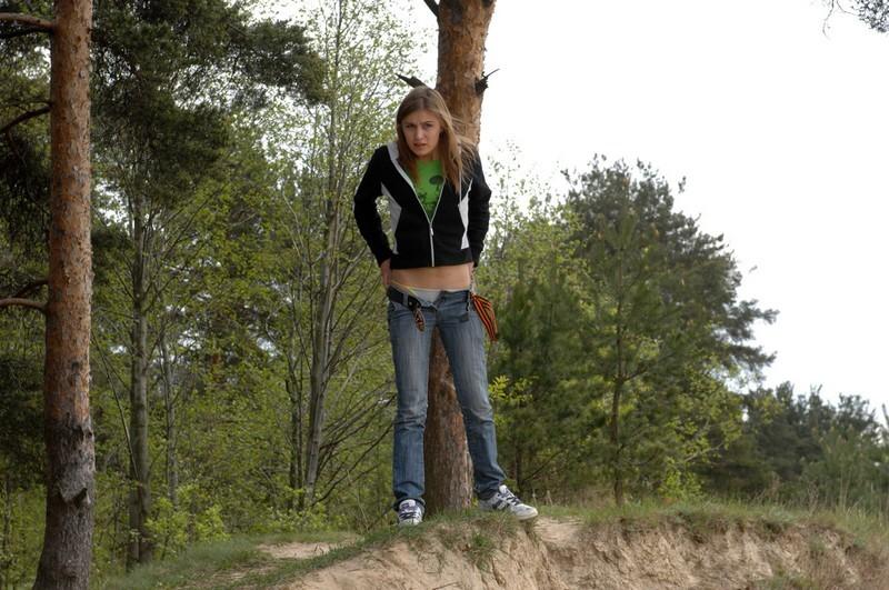 16P Girl takes off her pants and takes a piss outdoors