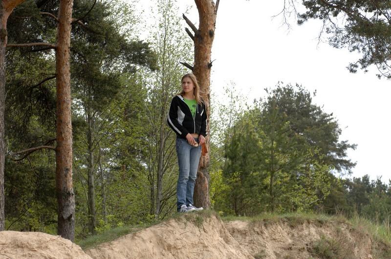 16P Girl takes off her pants and takes a piss outdoors
