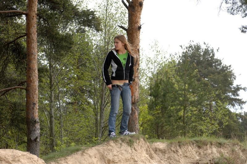 16P Girl takes off her pants and takes a piss outdoors