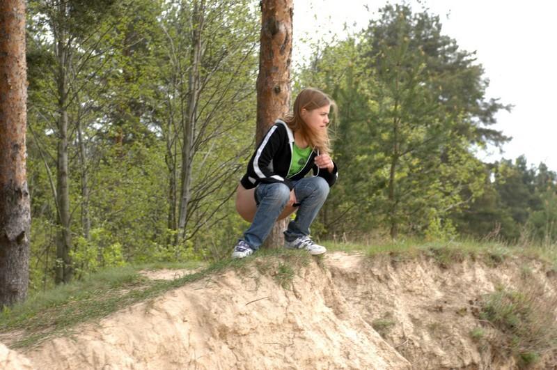 16P Girl takes off her pants and takes a piss outdoors