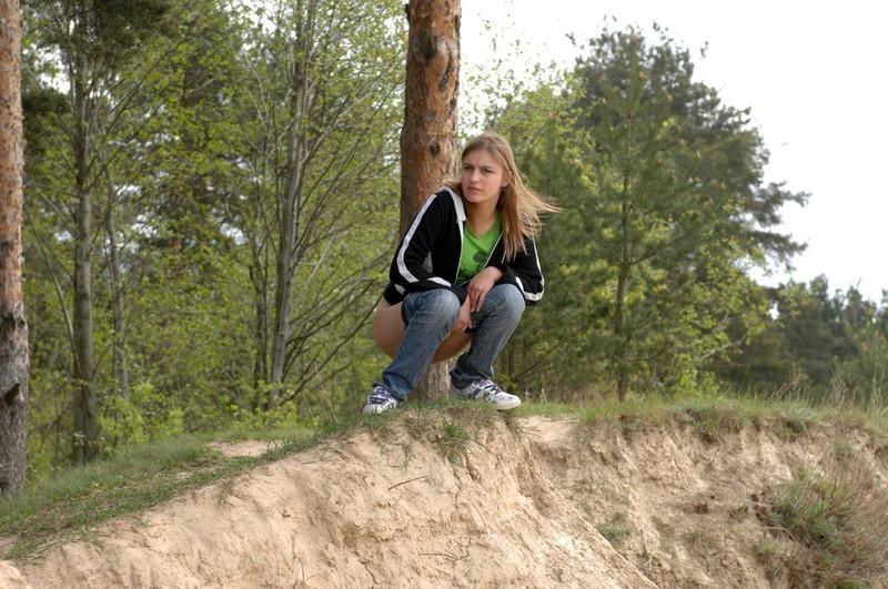 16P Girl takes off her pants and takes a piss outdoors