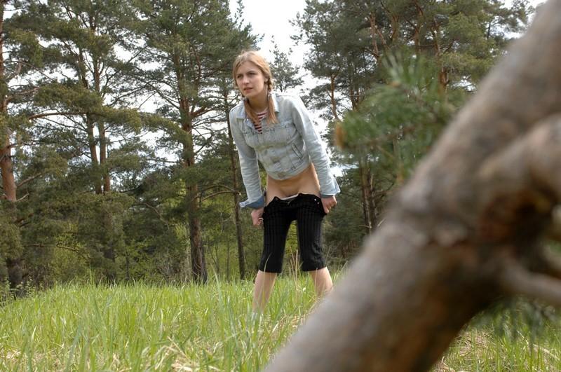 16P Teen gets filmed unknowingly while taking a piss in the woods