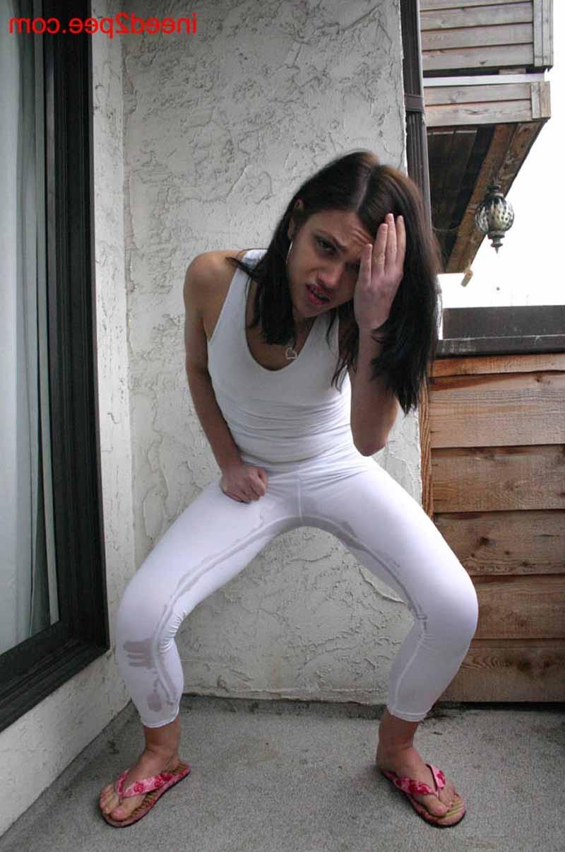 16P Very sexy petite chick peeing in her white tight pants