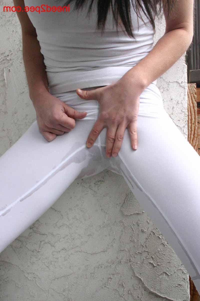 16P Very sexy petite chick peeing in her white tight pants