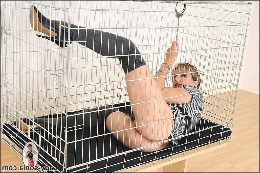 15P Lady  Sonia in a cage