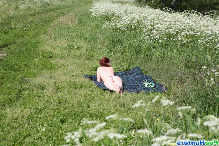 16P Sunbathing amateur teen in thong takes a piss outdoors
