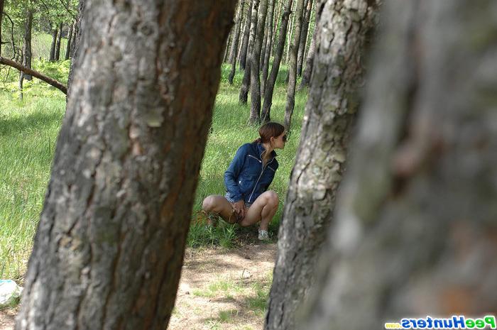 15P Sexy teen with shaved pussy takes a piss outdoors