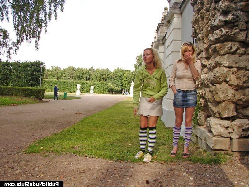 15P Naughty couple of hot lesbians enjoys showing off behind the building