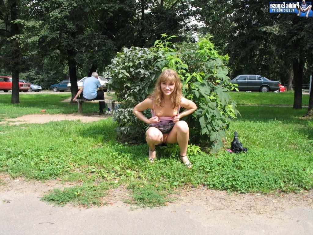 15P Blushless cutie makes a parade of her nude butt and cunny on the lawn